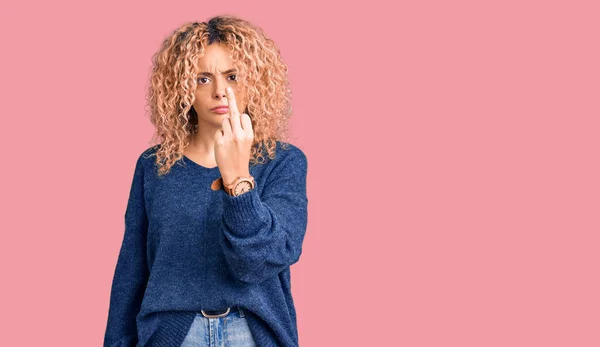 Young Blonde Woman Curly Hair Wearing Casual Winter Sweater Showing — Zdjęcie stockowe