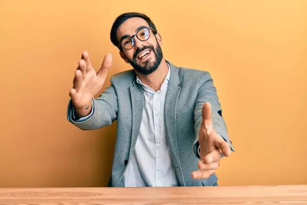 Young Hispanic Man Working Office Looking Camera Smiling Open Arms — Stock Photo, Image