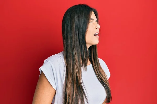 Young Brunette Woman Wearing Casual White Tshirt Red Background Hand — Stok fotoğraf