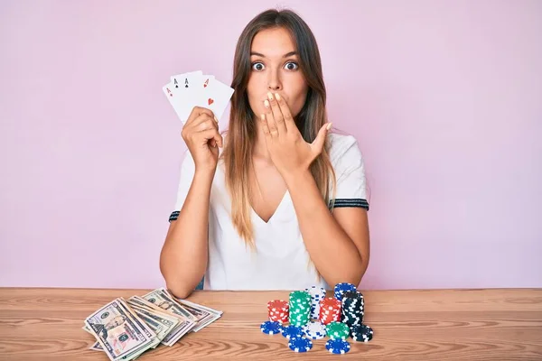 Beautiful Caucasian Woman Playing Poker Holding Cards Covering Mouth Hand — Φωτογραφία Αρχείου