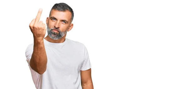 Middle Age Handsome Man Wearing Casual White Tshirt Showing Middle — Stockfoto