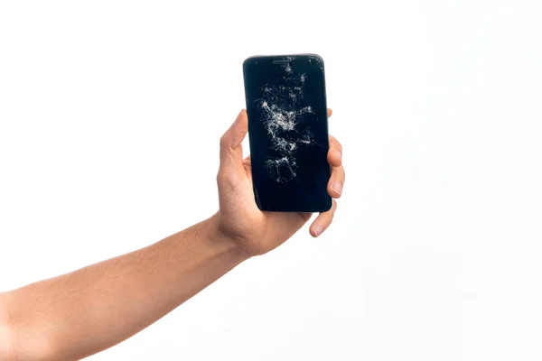 Ręka Kaukaski Młody Człowiek Gospodarstwa Uszkodzony Smartfon Pokazując Pęknięty Ekran — Zdjęcie stockowe