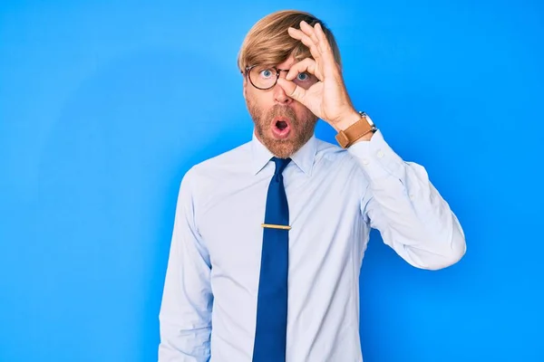 Young Blond Man Wearing Business Clothes Glasses Doing Gesture Shocked — Stock fotografie