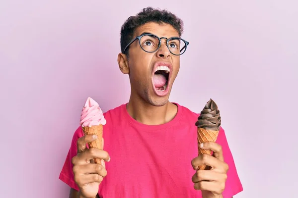 Young Handsome African American Man Holding Ice Cream Cones Angry — Stock Photo, Image