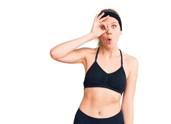 Young Beautiful Blonde Woman Wearing Sportswear Doing Gesture Shocked Surprised — Stock Photo, Image