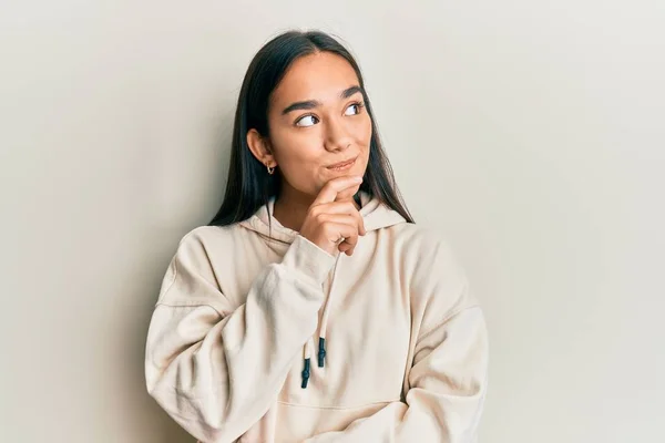 Young Asian Woman Wearing Casual Sweatshirt Thinking Concentrated Doubt Finger — Stock Photo, Image