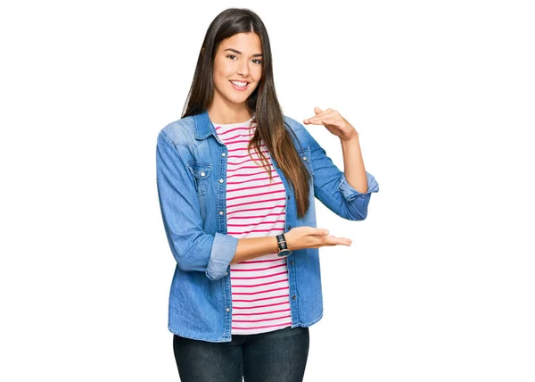 Young Brunette Woman Wearing Casual Clothes Gesturing Hands Showing Big — Stock Photo, Image
