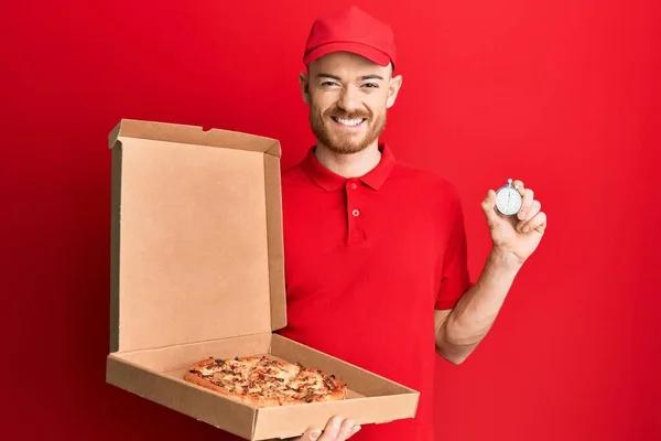 Young Redhead Man Wearing Delivery Uniform Holding Pizza Box Countdown — Stock Photo, Image