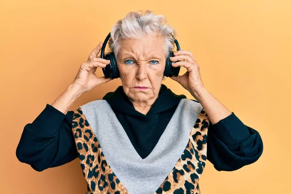 Senior Grey Haired Woman Listening Music Using Headphones Depressed Worry — Stock Photo, Image