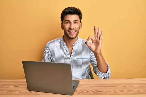 Young Handsome Man Working Office Laptop Doing Sign Fingers Smiling — Stock Photo, Image