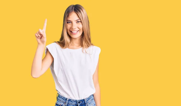 Beautiful Caucasian Woman Blonde Hair Wearing Casual White Tshirt Showing — Stock Photo, Image