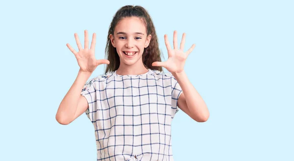 Cute Hispanic Child Girl Wearing Casual Clothes Showing Pointing Fingers — Stock Photo, Image