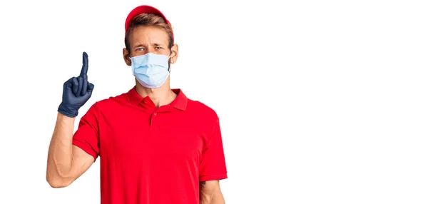 Handsome Blond Man Beard Wearing Delivery Uniform Medical Mask Pointing — Stock Photo, Image