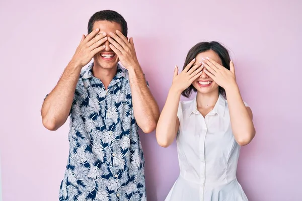 Beautiful Couple Wearing Casual Clothes Covering Eyes Hands Smiling Cheerful — Stock Photo, Image