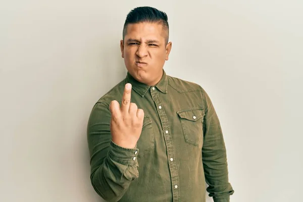 Young Latin Man Wearing Casual Clothes Showing Middle Finger Impolite — Foto Stock