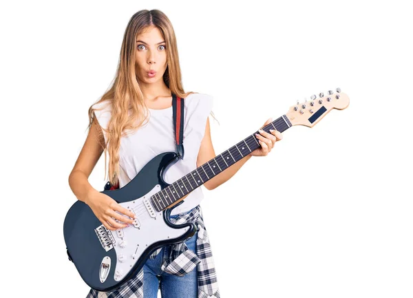 Beautiful Caucasian Woman Blonde Hair Playing Electric Guitar Scared Amazed — Stock Photo, Image