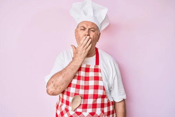 Senior Grey Haired Man Wearing Professional Baker Apron Bored Yawning — Stock Photo, Image