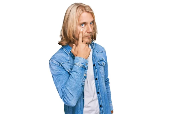 Caucasian Man Blond Long Hair Wearing Casual Denim Jacket Pointing — Stock Photo, Image
