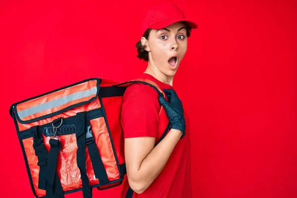Young Hispanic Woman Holding Take Away Backpack Scared Amazed Open — Stock Photo, Image
