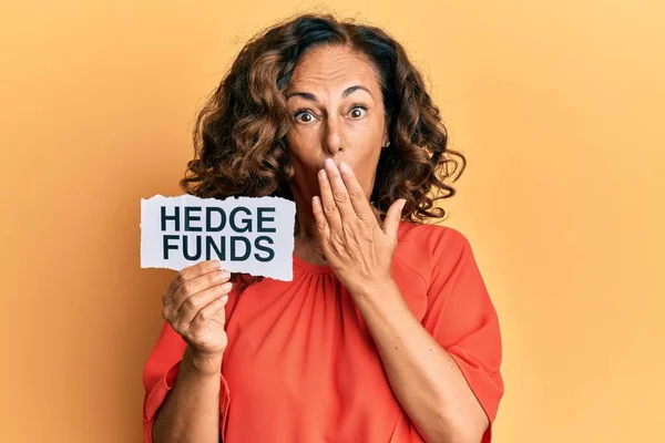 Middle Age Hispanic Woman Holding Hedge Funds Message Paper Covering — Stock Photo, Image