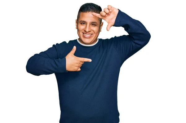 Young Latin Man Wearing Casual Clothes Smiling Making Frame Hands — Stock Photo, Image