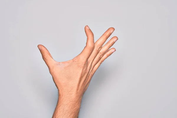 Mão Jovem Caucasiano Mostrando Dedos Sobre Fundo Branco Isolado Pegando — Fotografia de Stock