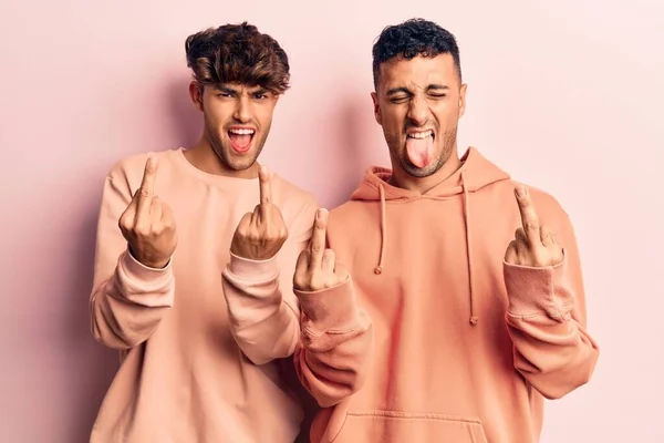 Young Gay Couple Wearing Casual Clothes Showing Middle Finger Doing — Stock Fotó