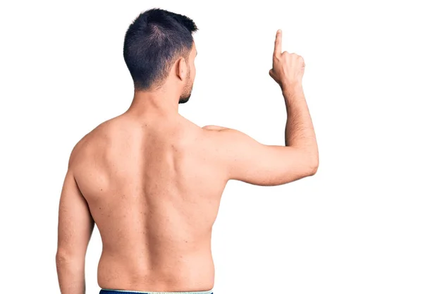 Young Handsome Man Wearing Swimwear Posing Backwards Pointing Ahead Finger — Stock Photo, Image