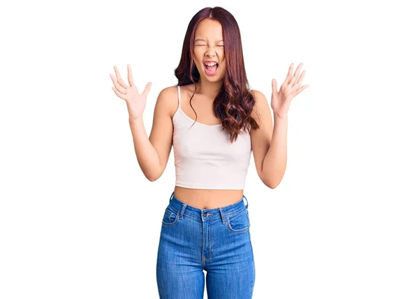 Young Beautiful Chinese Girl Wearing Casual Clothes Celebrating Mad Crazy — Stock Photo, Image