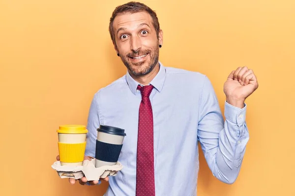 Young Handsome Man Holding Takeaway Cup Coffee Screaming Proud Celebrating — Stock Photo, Image