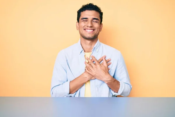 Young Handsome Hispanic Man Wearing Casual Clothes Sitting Table Smiling — Stock Photo, Image