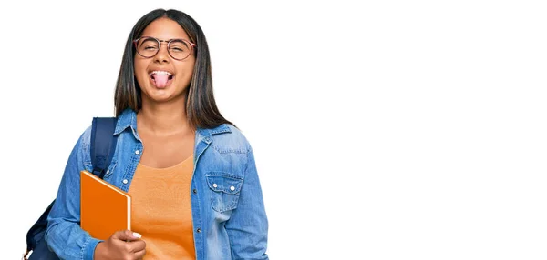 Young Latin Girl Wearing Student Backpack Holding Books Sticking Tongue — Stock Photo, Image