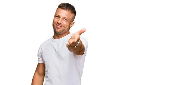 Handsome Muscle Man Wearing Casual White Tshirt Smiling Cheerful Offering — Stock Photo, Image