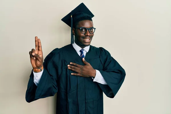 Handsome Black Man Wearing Graduation Cap Ceremony Robe Smiling Swearing — Stock Photo, Image