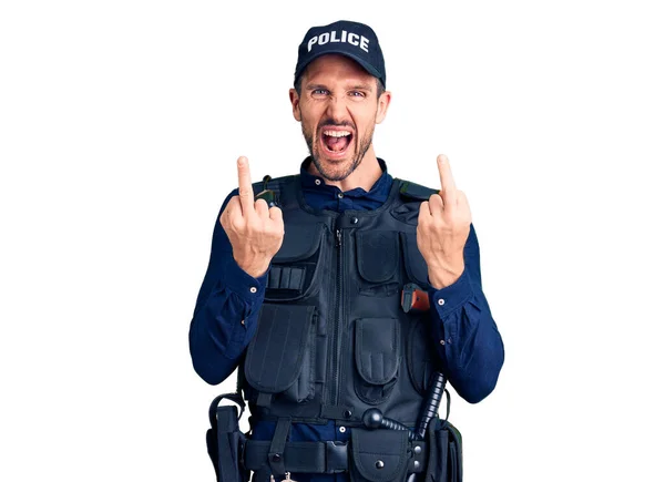 Young Handsome Man Wearing Police Uniform Showing Middle Finger Doing — Stok fotoğraf
