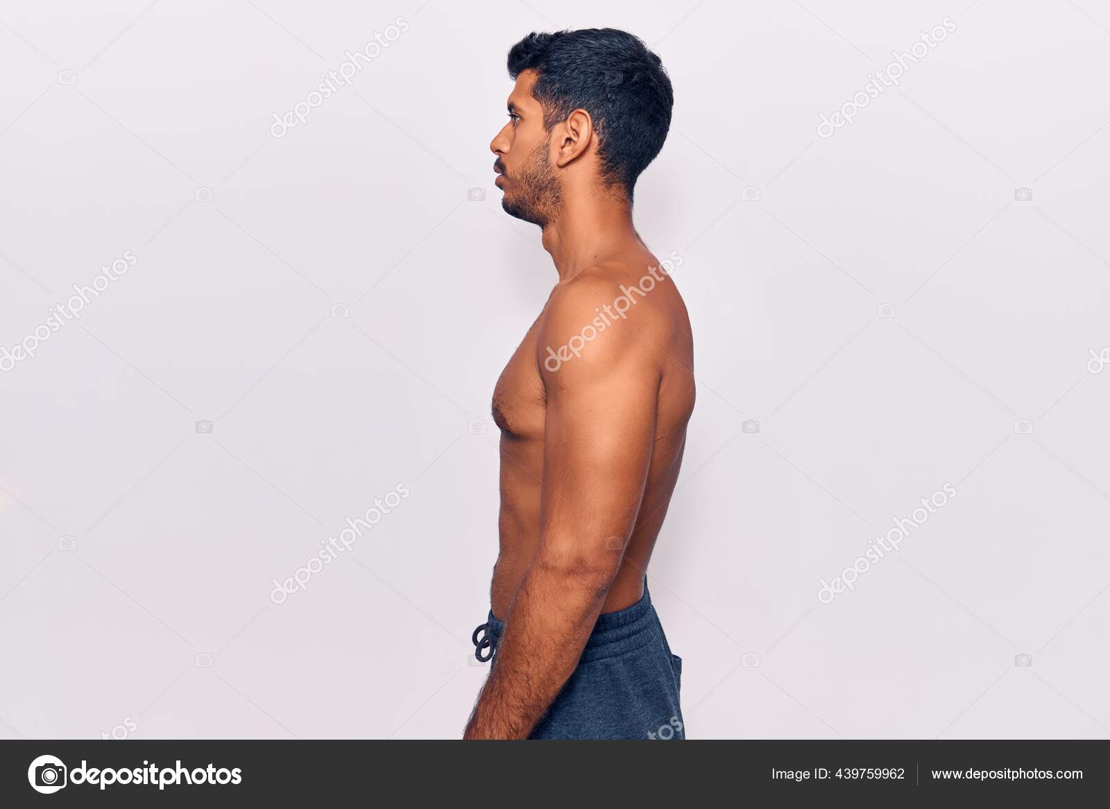 closeup shot of young fashion model side pose on isolated white background  Stock Photo - Alamy