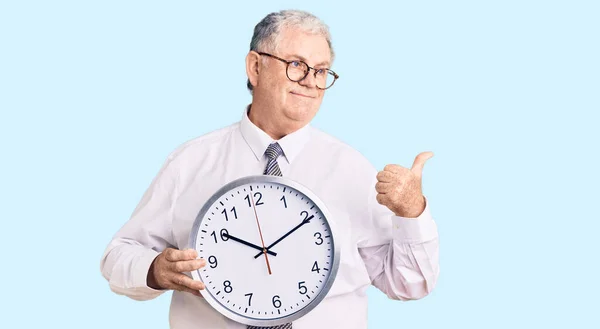 Senior Grey Haired Man Wearing Business Clothes Holding Clock Pointing — Stock Photo, Image