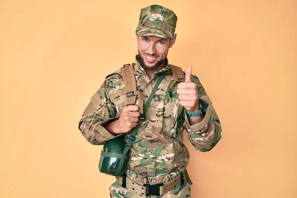 Young Caucasian Man Wearing Camouflage Army Uniform Canteen Smiling Happy — Zdjęcie stockowe