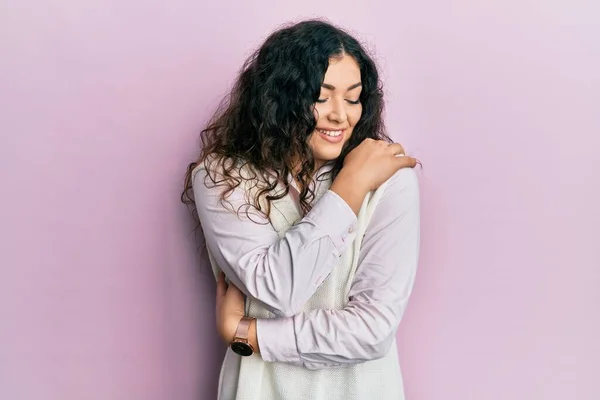 Young Brunette Woman Curly Hair Wearing Casual Clothes Hugging Oneself — Stock Photo, Image