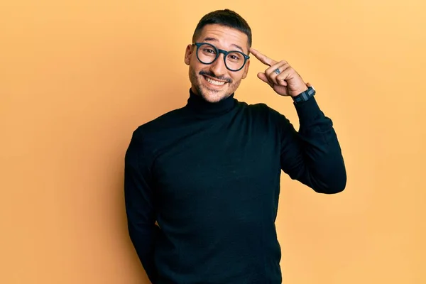 Handsome Man Tattoos Wearing Turtleneck Sweater Glasses Smiling Pointing Head — Stock Photo, Image