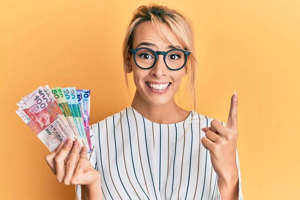 Beautiful Blonde Woman Holding Hong Kong Dollars Banknotes Smiling Idea — Stock Photo, Image