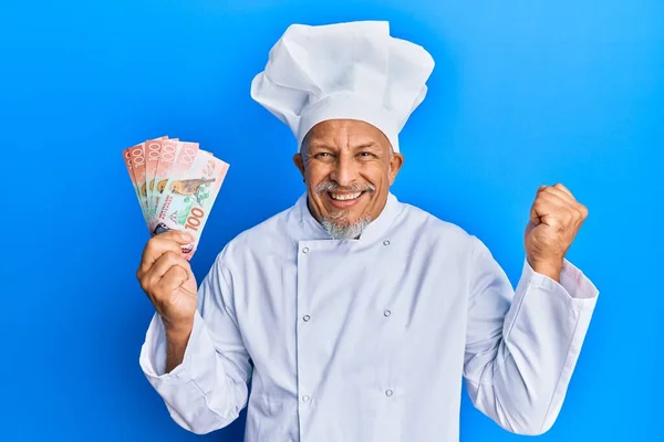 Middle Age Grey Haired Man Wearing Professional Cook Uniform Holding — Stock Photo, Image