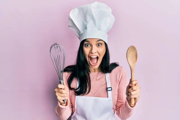 Young Hispanic Woman Wearing Baker Uniform Holding Spoon Whisk Celebrating — Stock Photo, Image