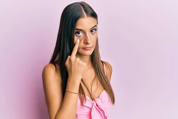 Young Hispanic Woman Wearing Casual Style Sleeveless Shirt Pointing Eye — Stock Photo, Image