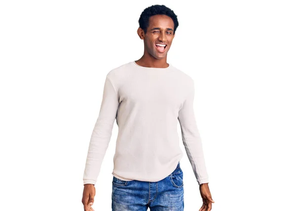 African Handsome Man Wearing Casual Winter Sweater Winking Looking Camera — Stock Photo, Image