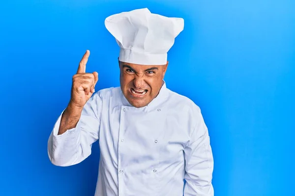 Mature Middle East Man Wearing Professional Cook Uniform Hat Pointing — 图库照片