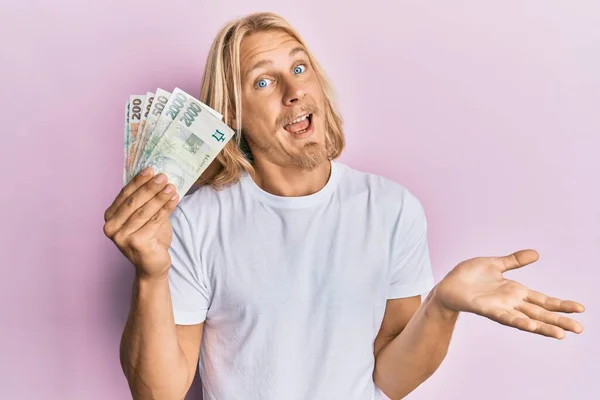 Caucasian Young Man Long Hair Holding Czech Koruna Banknotes Celebrating — Stock Photo, Image