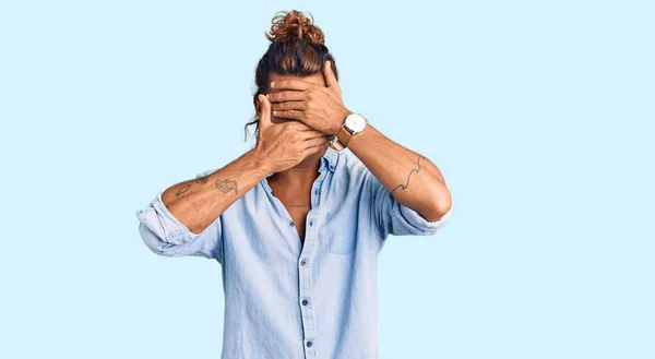 Young Hispanic Man Wearing Summer Style Covering Eyes Mouth Hands — Stock Photo, Image