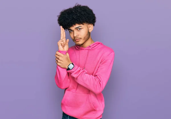 Young African American Man Afro Hair Wearing Casual Pink Sweatshirt — Stock Photo, Image