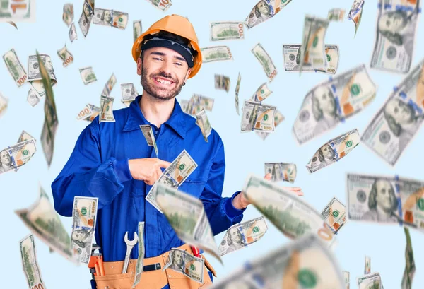 Young Hispanic Man Wearing Worker Uniform Amazed Smiling Camera While — Stock Photo, Image